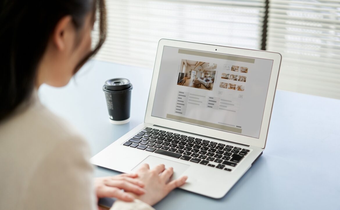 Asian,Women,Viewing,Real,Estate,Websites,On,A,Computer