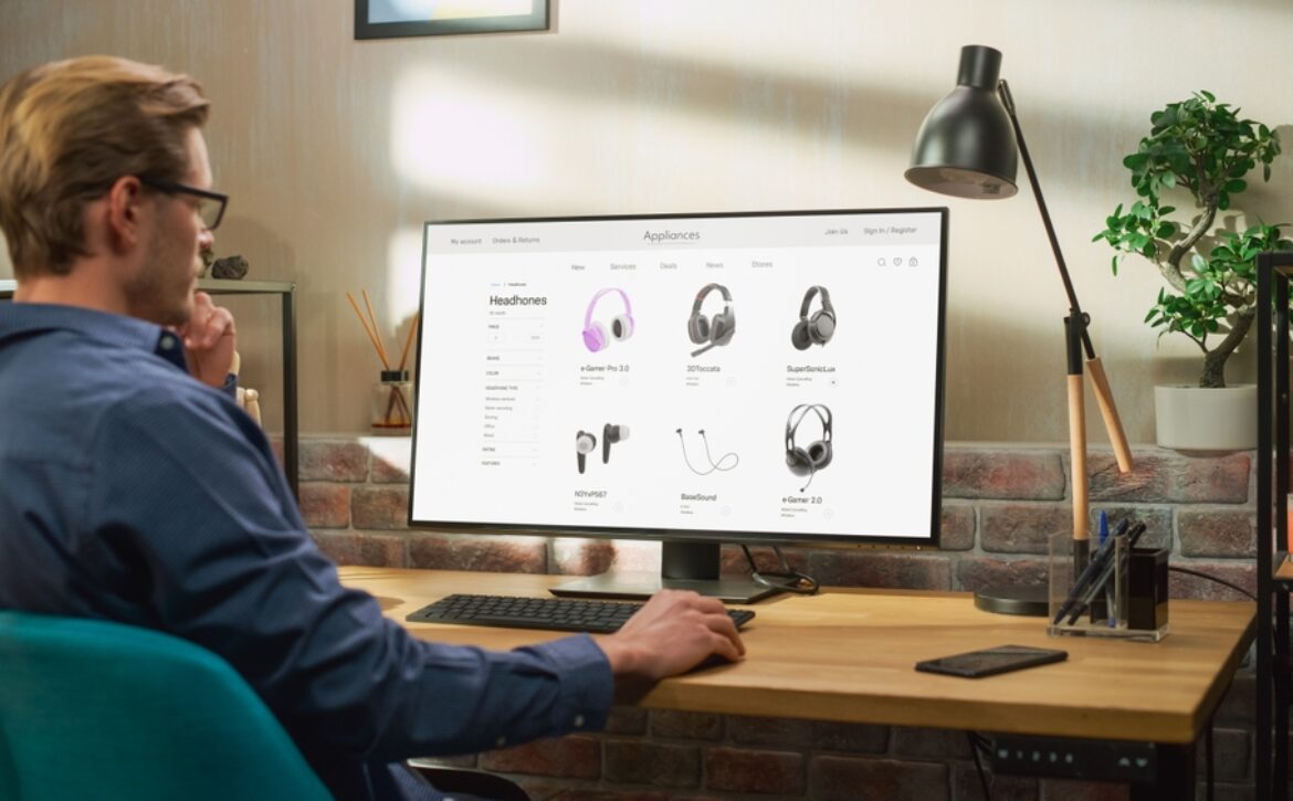 At,Home,Office:,Man,Using,Desktop,Computer,,Online,Shopping,For