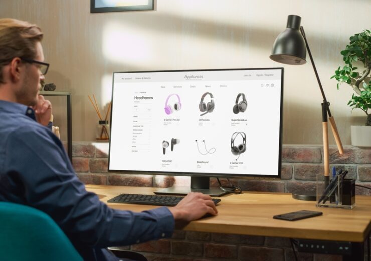 At,Home,Office:,Man,Using,Desktop,Computer,,Online,Shopping,For