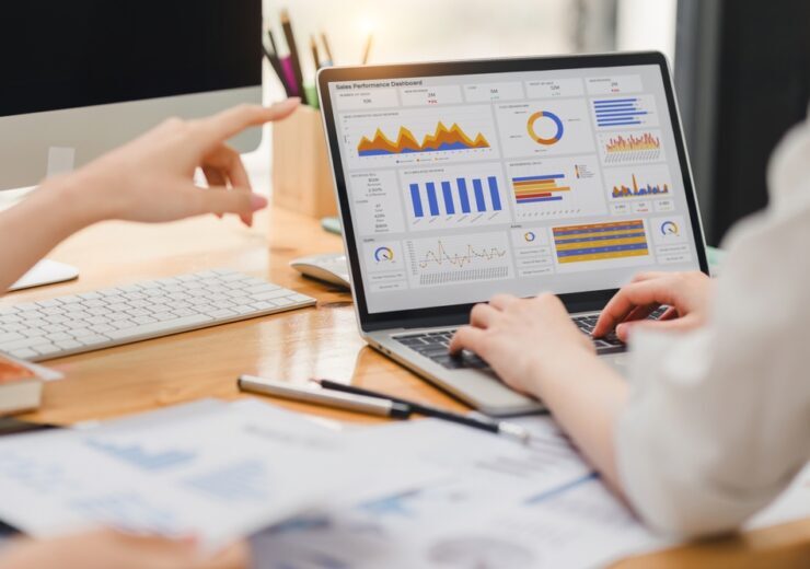 Two,Businesspeople,Or,An,Accountant,Team,Are,Analyzing,Data,Charts,